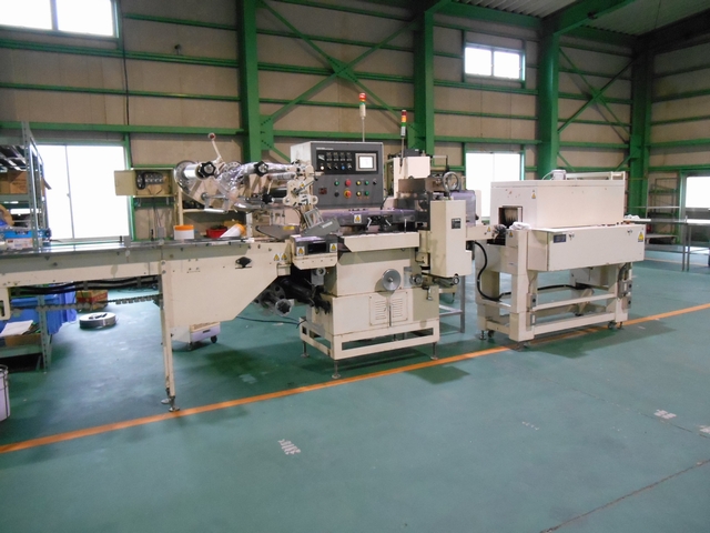 k-4915 横ピロー包装機｜クア・ソリューション